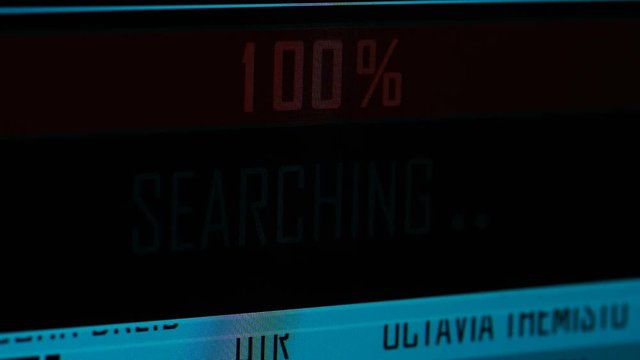 Close up of search tool completing and finding a match