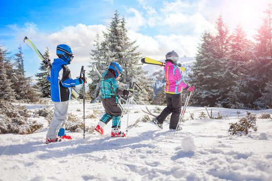  happy family ski team fun on beautiful mountain