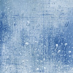 Blue scratched texture background with wet glass.