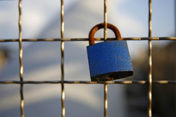 love padlock chained to bridge