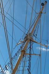 Rigging of a large sailing vessel against blue sky