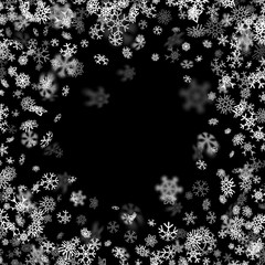 Snowfall background with snowflakes blurred in the dark