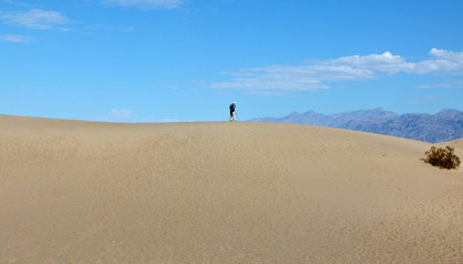Lonley Photographer in the Sand Dunes of Death Valley NP, USA