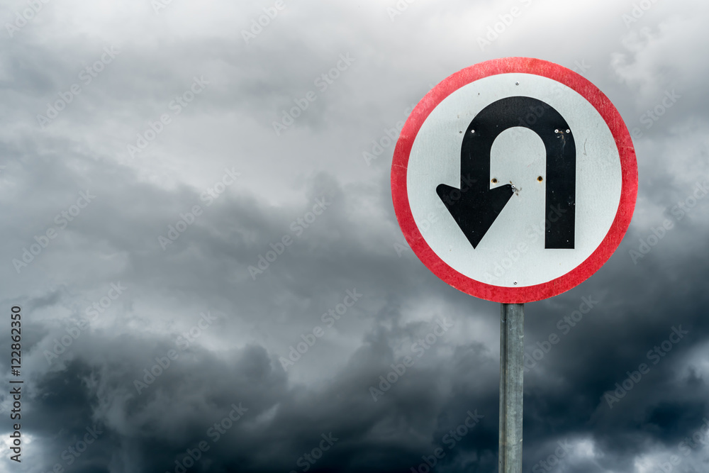 Wall mural U turn sign on white dark cloud background with clipping path - Wall murals
