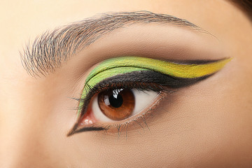 Colourful eye makeup, closeup