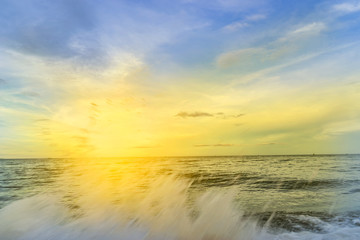 abstract scene of sea with water splash and sunset time