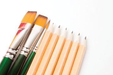 Pencils and paintbrushes