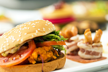 beef berger and fried potato on wood fast food junk food