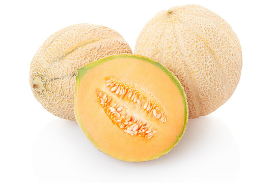 Cantaloupe melons and section on white, clipping path