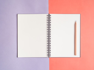 Top view of notebook on colorful background