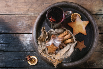 Hot red mulled wine with cookies 