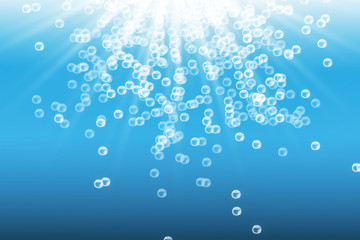 abstract white water bubbles isolated on blue underwater in sunlight 