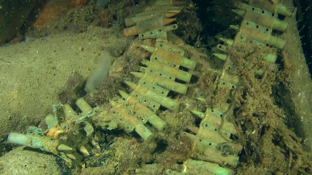 Tape with patrons for machine gun on the deck of the wreck.
