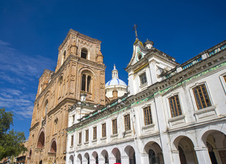 Fototapeta na wymiar Side view of the Cuenca Cathedral and dome on a sunny morning day. Cuenca Ecuador