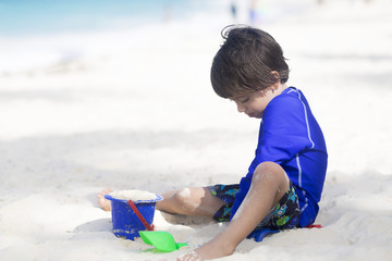 Happy Boy Playing at the beach