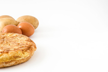 Traditional spanish omelette with potatoes and eggs isolated on white background

