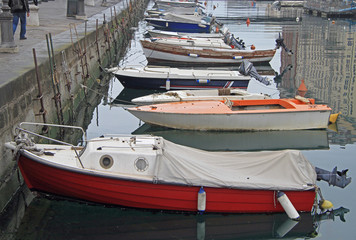 Fototapeta na wymiar Canal grande with boats in Trieste city center