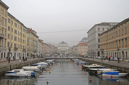 Canal grande with boats in Trieste city center