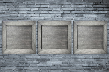 Gray wood frame on grey brick wall texture background