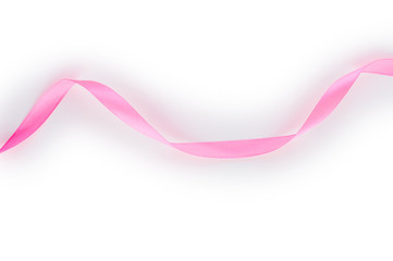 Pink satin ribbon isolated on white background. Top view. Flat lay.