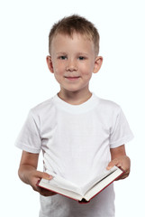 Boy with an open book, isolated on a white.