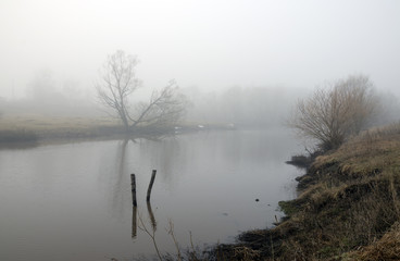 Springtime.Misty spring landscape with river.