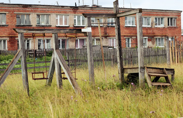 Fototapeta na wymiar Old abandoned sports ground town russia