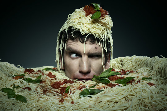 Man drowning in spaghetti. 