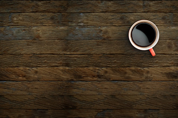 Coffee red cup top view on wooden table background