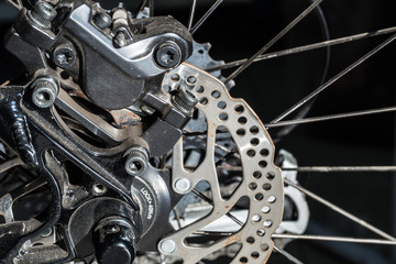 Bicycle disc brake system used old with dust and rusty.