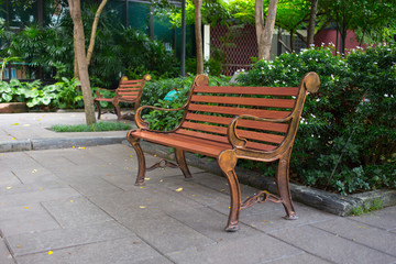 Obraz premium Wood vintage style bench in the garden.