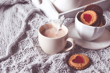 breakfast in bed with coffee and cookies