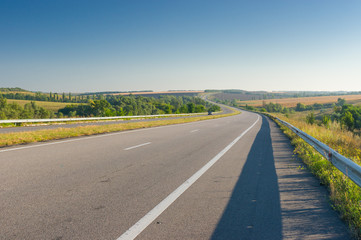 Fototapeta premium Morning landscape with high-way in central Ukraine