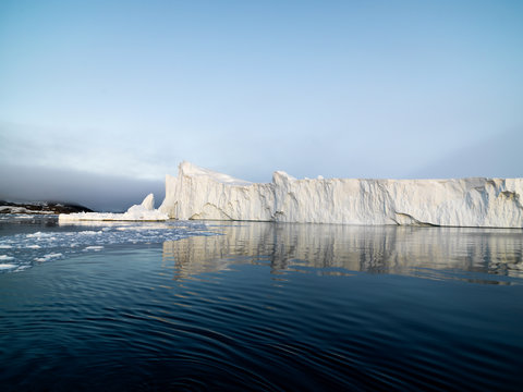 huge icebergs are on the arctic ocean in Greenland