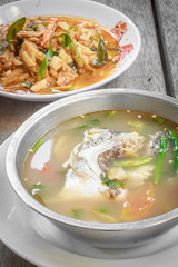 Thai food red curry pig with bamboo shoots and fish soup.