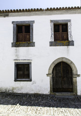 Whitewashed home entrance