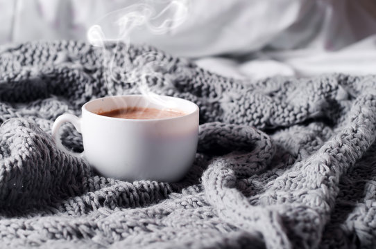 Having A Cup Of Coffee In Bed