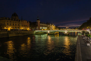 Street on the waterfront of Paris by night in summer