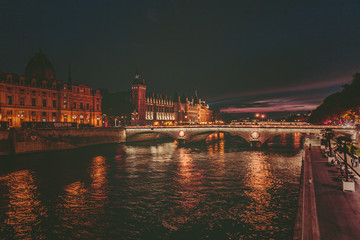 Fototapeta na wymiar Street on the waterfront of Paris by night in summer
