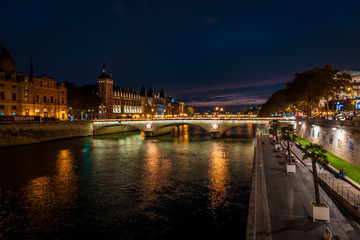 Street on the waterfront of Paris by night in summer