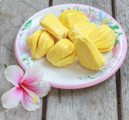 Fresh jackfruit in the bowl on wood table.