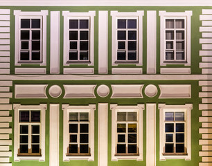 Obraz premium Several windows in a row on night illuminated facade of Saint Petersburg State University front view, Russia.