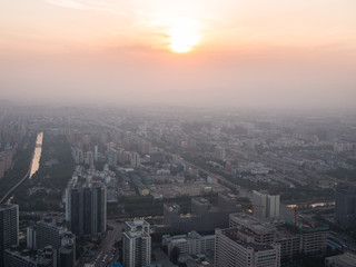 Evening view from the Central Radio TV Tower at the downtown area Beijing on sunset background