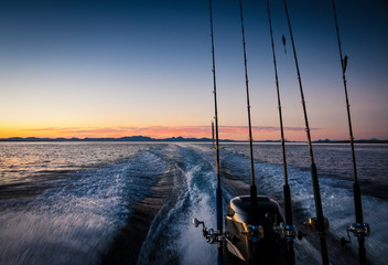 Fishing boat with wake at Dawn Sea of Cortez - Powered by Adobe