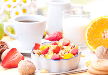 Breakfast with cereals, fresh fruit and milk