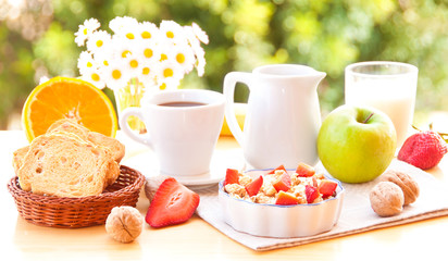 Breakfast with cereals, fresh fruit and milk
