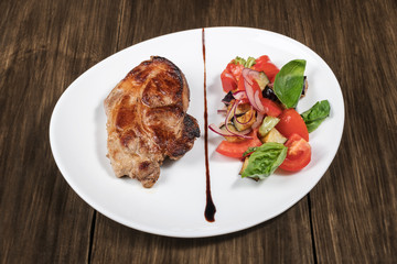 Grilled steak and fresh salad