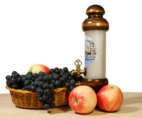 bottle of wine and a bunch of grapes