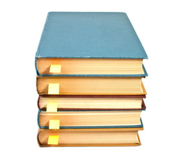 stack of books with bookmarks