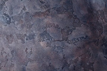 grungy black background of natural cement stone old texture